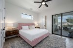 Guest Bedroom with King Bed and Small En-Suite Bathroom and Pool/Patio Access